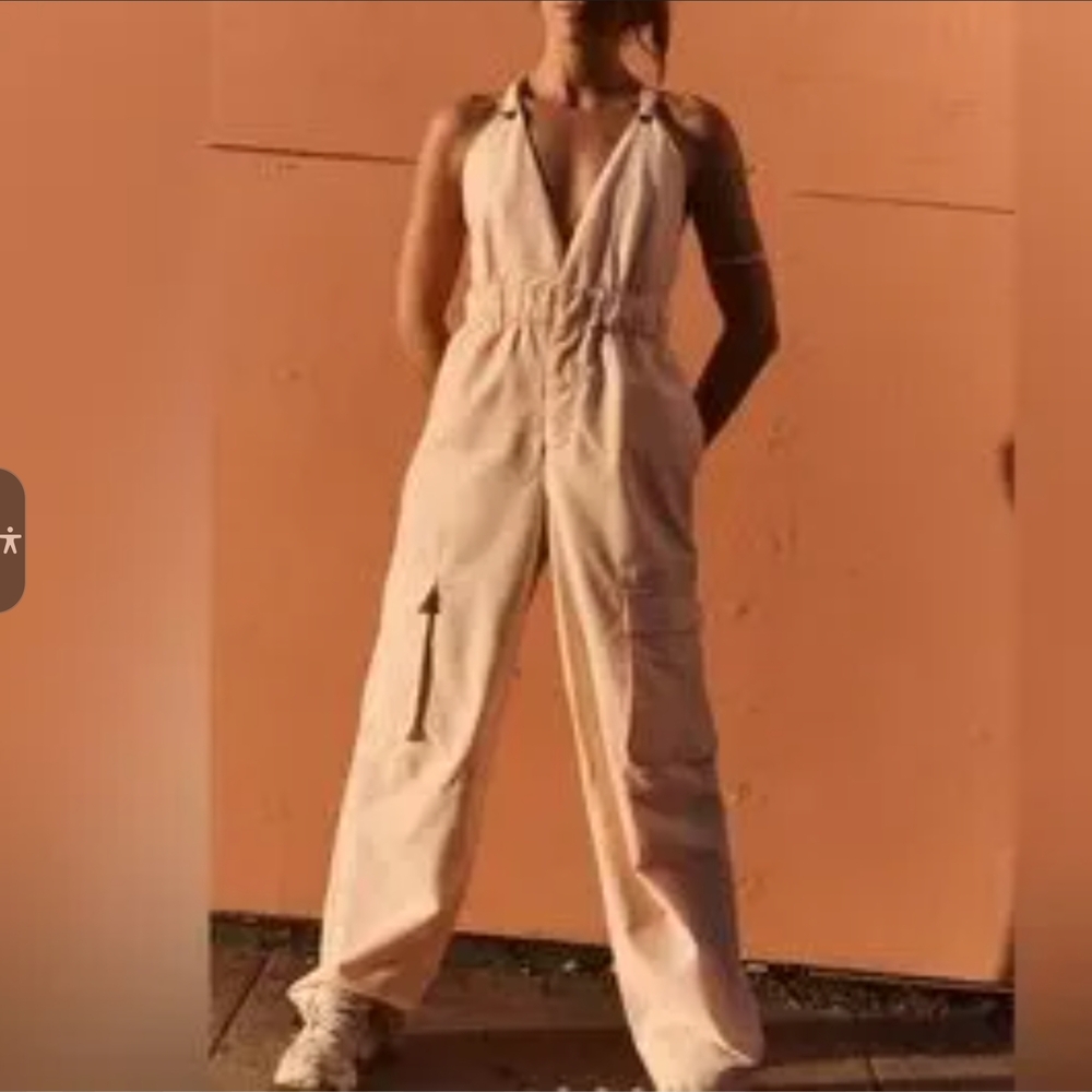 FP Movement by Free People Off Shorejumpsuit In Peach